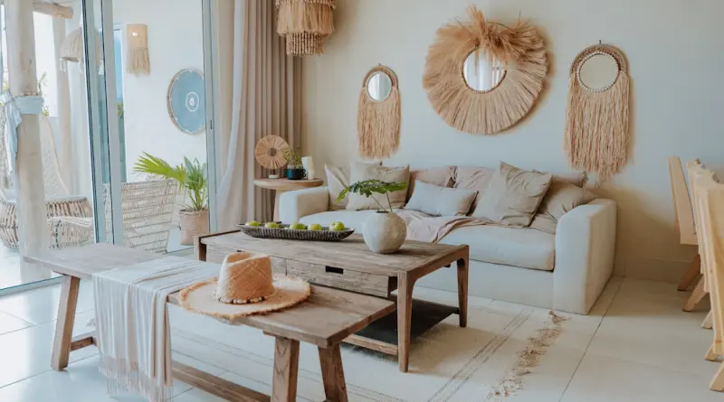 A stylish, neutral-toned living room is shown.